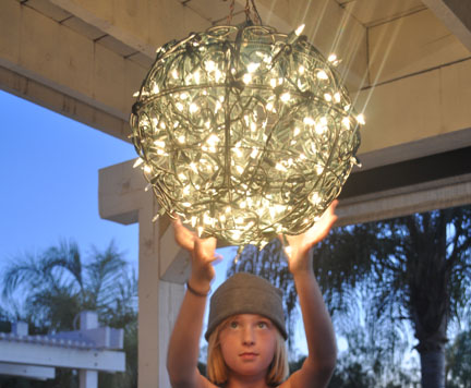 Repurpose Flower Baskets into a Glowing Outdoor Chandelier | Club ...
