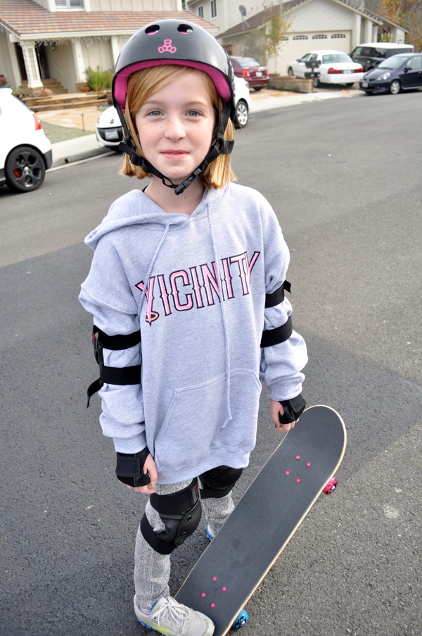 tween with skateboard
