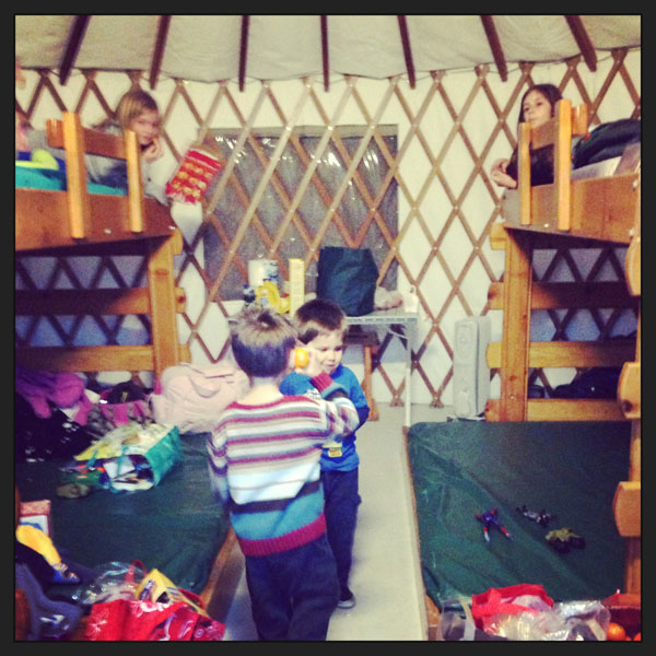 kids camping in yurt