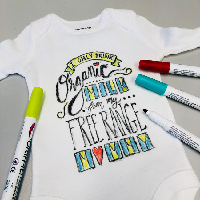 Hand lettered baby onesie gift idea